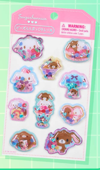 shugabani_info's tweet photo. 【新商品情報】

「キャラめきシールふれんず」が登場🎀

#シュガーバニーズ もラインナップ🐰🤍🤎
オーロラや金箔、ビーズ入りのぷっくりシール＆シールバインダーが可愛い✨

📅7/15(水)発売
📍サンリオ直営店
🛒オンラインショップ：https://t.co/queJ1rDcjT　#pr

#サンリオ #しろうさ #くろうさ https://t.co/8VRHGEZqug