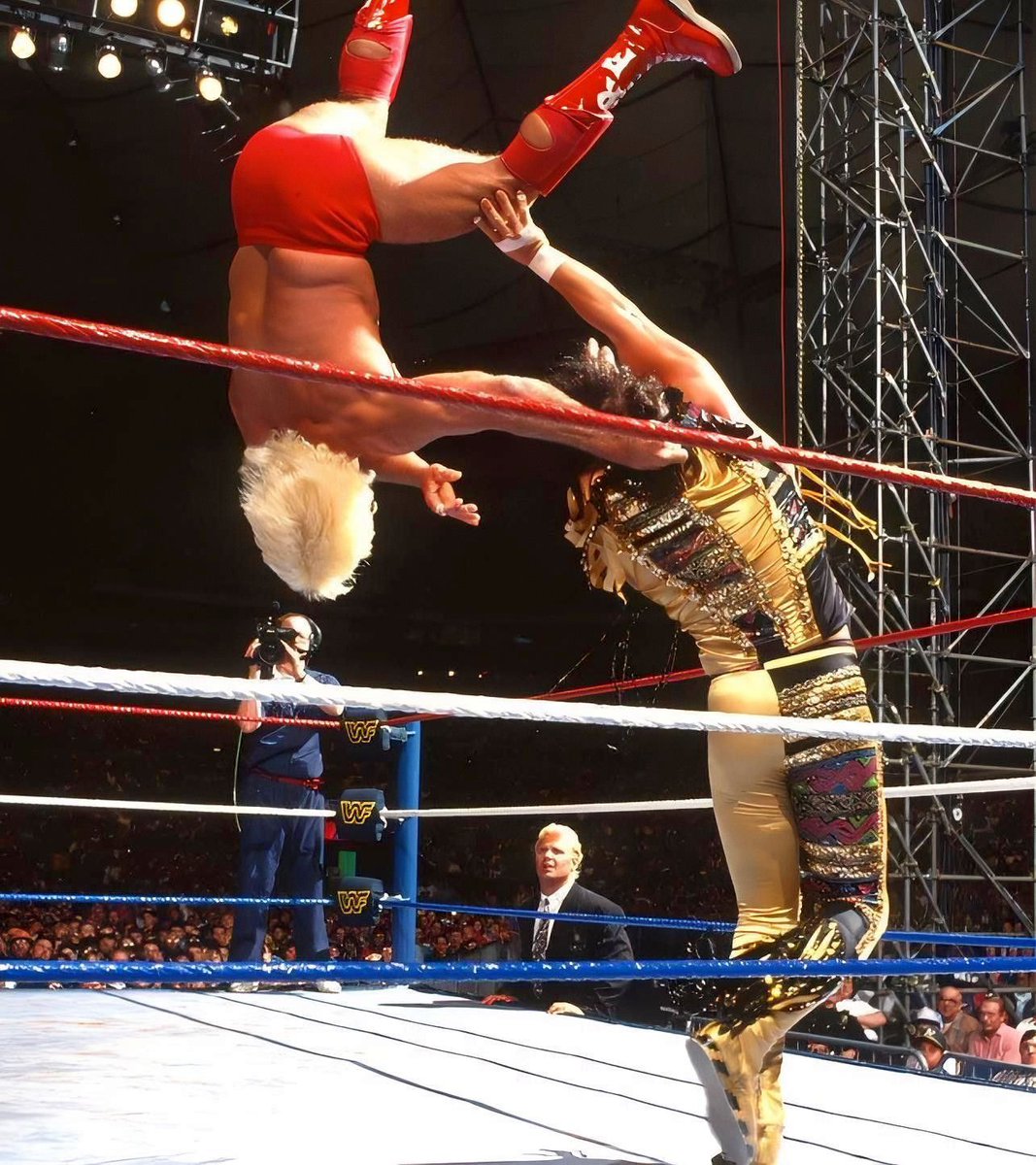 WWFWrestling1's tweet photo. WrestleMania Wednesday! "Macho Man" Randy Savage recaptures the WWF World title, defeating Ric Flair at WrestleMania VIII in 1992. #WWF #WWE #MrPerfect #RicFlair #Elizabeth #RandySavage https://t.co/Q768Fw6hyz