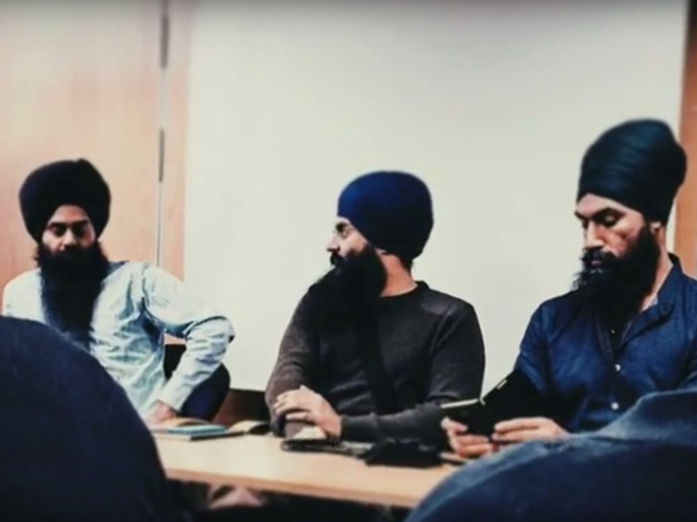 bcbluecon's tweet photo. In light of the FBI's India organized crime arrests worldwide today, including Canada.  

Guess who is on the right during this California Indo gangster event looking at his phone.   

Yup, that's the last NDP leader Jagmeet Singh.  

Check out the Indo gang credentials of the other two.