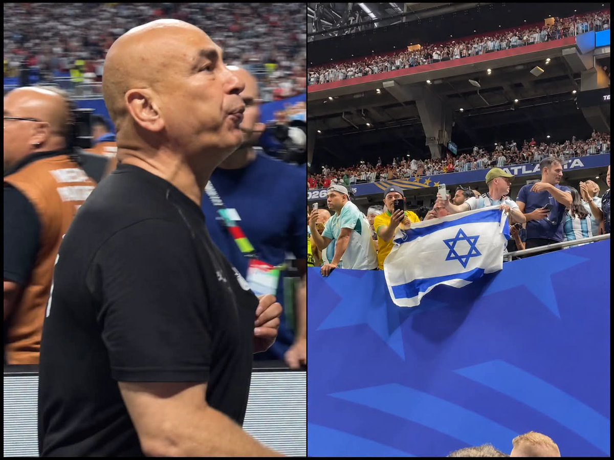 QudsNen's tweet photo. An Argentine fan attempted to provoke Egypt national team head coach Hossam Hassan by waving an Israeli flag in front of him after yesterday's World Cup match. Hassan responded by spitting towards the fan and the flag. https://t.co/HQSliNeSZr