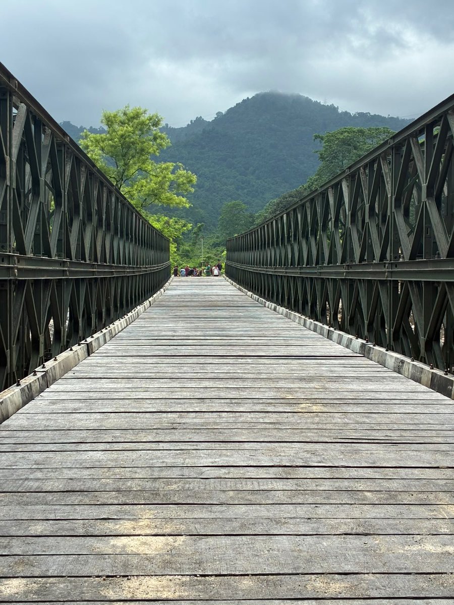 TheDarjChron's tweet photo. A BRIDGE OVER BALASON

In October 2025, when the original bridge over Balason river at Dudhey was washed away, Darjeeling MP Raju Bista wrote to then Chief Minister Mamata Banerjee, requesting that a Bailey Bridge be constructed to restore connectivity.

Dudhey bridge is vital, as it connects the Mirik region to the plains.

Yet, CM Mamata Banerjee turned a complete deaf ears to the request and chose not to reach out to the Army. Instead she constructed a hume-pipe bridge. Such hume-pipe bridges are used in slow moving and less water areas, whereas Balason is a mighty river that originates in Darjeeling hills. It carries the water from multiple smaller rivulets – and travels with a lot of force and speed.

So, building a hume-pipe bridge over such a mighty river was stupid – but TMC Chief was known to take such stupid decisions. In the very first rain of monsoon this year, on the night of June 18-19, 2026 the hume-pipe bridge was washed away, once again severing the connection between Mirik and rest of the state.

Darjeeling MP Raju Bista once again reached out to the Chief Minister, only this time its the BJP Government, and thankfully Suvendu Adhikari is the CM and not Mamata Banerjee.

Within 5-days of the hume-pipe bridge being washed away, a walkable Bailey Bridge was constructed by the Indian Army, and on Day-19, today a motorable Bailey Bridge has been completed, which will be open for traffic from tomorrow evening.

This bridge not only symbolizes the change in governance style, but also marks the priority of the government. We had a TMC government that refused to officially notify a disaster, and we now have a government that actually cares enough to get the bridge over Balason constructed in a timely manner.

We share our gratitude to Darjeeling MP Raju Bista for relentlessly pursuing, and CM Suvendu Adhikari for caring. Indian Army, PWD and others for constructing this vital link.

Hopeful new beginnings.

@adgpi @easterncomd