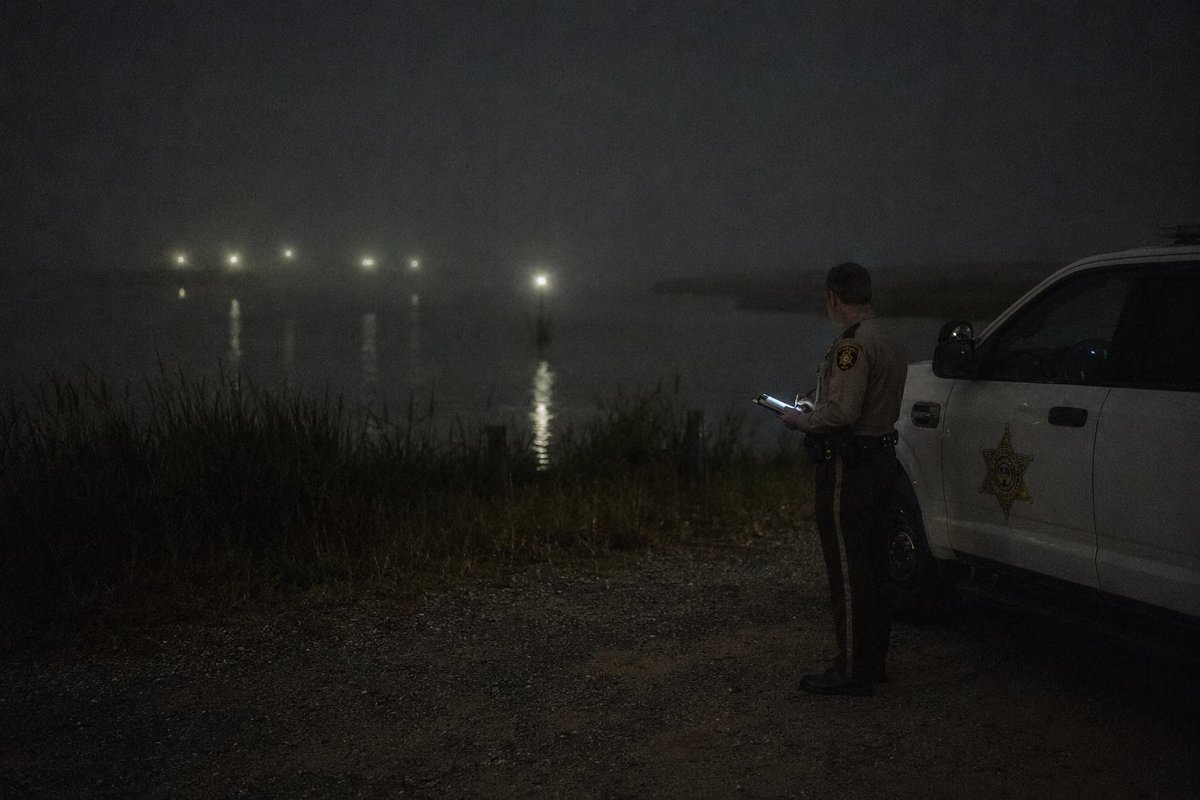 SouthernPungoSD's tweet photo. MORNING BLOTTER — Wednesday, 8 July
A slow night, which the Department notes with gratitude and no confidence.

2:47 AM — Caller reported suspected fireworks over the marsh: low, pale, ongoing. The responding deputy confirmed the lights are not fireworks, and are not suspicious, as they are behaving exactly as they always have. The caller was advised of the standing guidance. The caller stated that one of the lights was "closer than the others get." This has been entered into the file. The annual census will be taken early this year.

Photograph taken during the 2:47 AM response. The responding deputy reports the closer light maintained its distance for the duration of the response, which the deputy notes is not the same as keeping it. Appended to the file. The census begins Thursday.

ADVISORY — Overnight, the seating staged at the Causeway Box ahead of Friday's Founders' Observance was reversed. Every chair was found at dawn facing away from the water. Volunteers are reminded of the standing instruction not to adjust chairs that are already facing the water; no instruction exists for chairs found otherwise, and one is being drafted. The chairs have been returned. The Department notes, for whoever is responsible, that the Observance is Friday, that attendance is welcome, and that turning the chairs is unnecessary, as a seat is left empty every year and always will be.

REMINDER — Voting continues for Miss Southern Pungo Grace Sherwood 2026. All four certified candidates appear in the poll. The Department does not endorse candidates. It notes only that one candidate already knows how you voted, and that this should not influence you, although it will. Please submit your votes to the previously posted social media release.