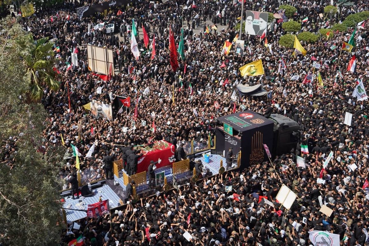 Khamenei_m's tweet photo. Scenes of the dense crowds at Thawrat al‑Ishrin Square in Najaf, gathered for the funeral procession of the pure body of the martyred Leader of the Islamic Revolution, July 8, 2026

#WeMustRise
#MartyrKhamenei https://t.co/G31INuCxkK
