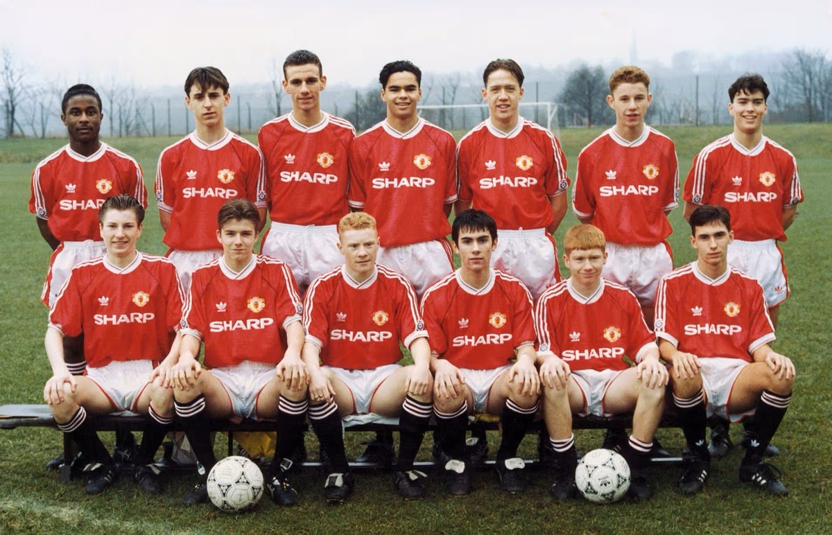 Unitedfans2023's tweet photo. TRAINEES SIGNED ON 8th JULY 1991 BY MANCHESTER UNITED
(On this day 35 years ago)

David Beckham - 394 first-team games / 85 goals
Karl Brown - 0/0
Nicky Butt - 387 games / 26 goals
Chris Casper - 7 games / 0 goals
Craig Dean - 0/0
Keith Gillespie - 14 games / 2 goals
Gary Neville - 602 games / 7 goals
John O'Kane - 7 games / 0 goals
Mark Rawlinson - 0/0
Joe Roberts - 0/0
Steven Riley - 0/0
Robbie Savage - 0/0
Paul Scholes - 718 games / 155 goals
Ben Thornley - 14 games / 0 goals

Manchester United's youth team in 1992. 
Back row left to right: Raphael Burke, Gary Neville, Simon Davies, John O' Kane, Andy Noone, Nicky Butt and Ben Thornley. 
Front row: Robbie Savage, David Beckham, George Switzer, Keith Gillespie, Paul Scholes and Chris Casper.
#MUFC #OldTrafford