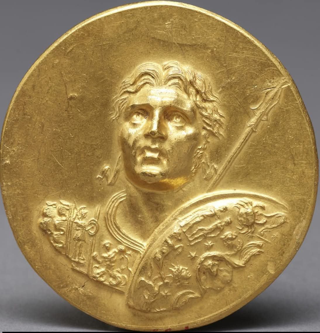 Dr_TheHistories's tweet photo. Stunning Gold Medallion with the Portrait Alexander the Great... 

This Medallion was discovered in Egypt as part of a hoard that comprised about twenty similar medallions (now dispersed among various museums), eighteen gold ingots, and six hundred gold coins issued by Roman emperors from Severus Alexander (r. 222-235 CE) to Constantius I (r. 293-306 CE). One of the medallions, now in the Calouste Gulbenkian Museum in Lisbon, bears an inscription that possibly reads "Olympic games of the year 274", a date corresponding to 242-243 CE. It is possible that the medallions were intended as prizes to be given out at that event. Alternatively, they may have been issued by Emperor Caracalla (r. 198-217 CE), who is potrayed on some of them. Caracalla liked to be compared to the great king and conquerror Alexander of Macedon (r. 336-323 BC). Like Alexander, this Roman emperor waged war in the East, and actually died in the course of his campaign against the Parthians. 

This particular medallion shows Alexander the Great gazing heavenward and bearing a shield decorated with signs of the zodiac. This portrait shows him with his hair pulled back. He wears a decorated cuirass with a figure of Athena on the shoulder strap and, on the chest, a scene from the Gigantomachy (War of the Giants). The back depicts Alexander and Nike, goddess of victory, riding in a chariot, flanked by the deities Roma and Mars.

The Walter Art Museum, Baltimore Maryland.

#drthehistories