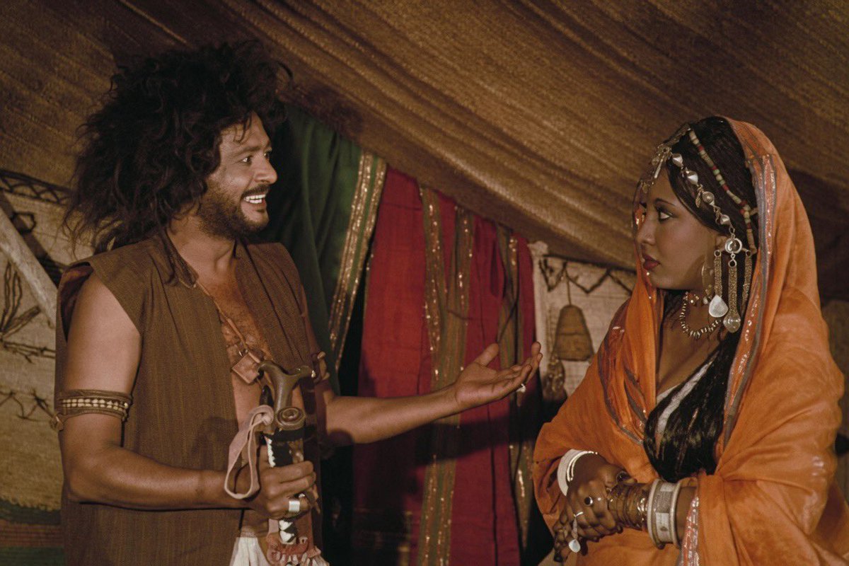 sudan_zaman's tweet photo. فيلم تاجوج (1977)
أول فيلم روائي طويل كامل الإنتاج في تاريخ السودان
إخراج: جاد الله جبارة
بطولة: الفنان صلاح بن البادية في دور المهلاق
والممثلة الق��يرة ماجدة حمدنا الله في دور تاجوج
صُوّر بالكامل في ريف شرق السودان في مناطقه الجبلية والسهول الواسعة

#السودان_زمان || #sudan_zaman https://t.co/ksauusZiHf