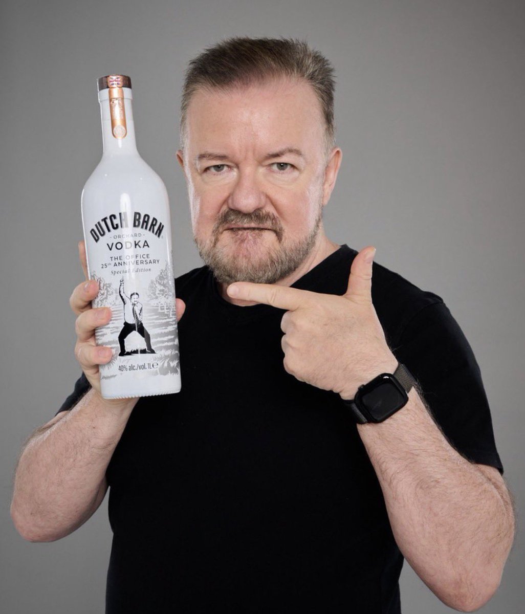 rickygervais's tweet photo. Tomorrow sees the 25 year anniversary of The Office. To commemorate this  historic occasion, we’ve made a Special Edition 1 Litre bottle of Dutch Barn vodka. Please buy one.  https://t.co/pGkKZrH0Y8 https://t.co/n5WOIrcsMq