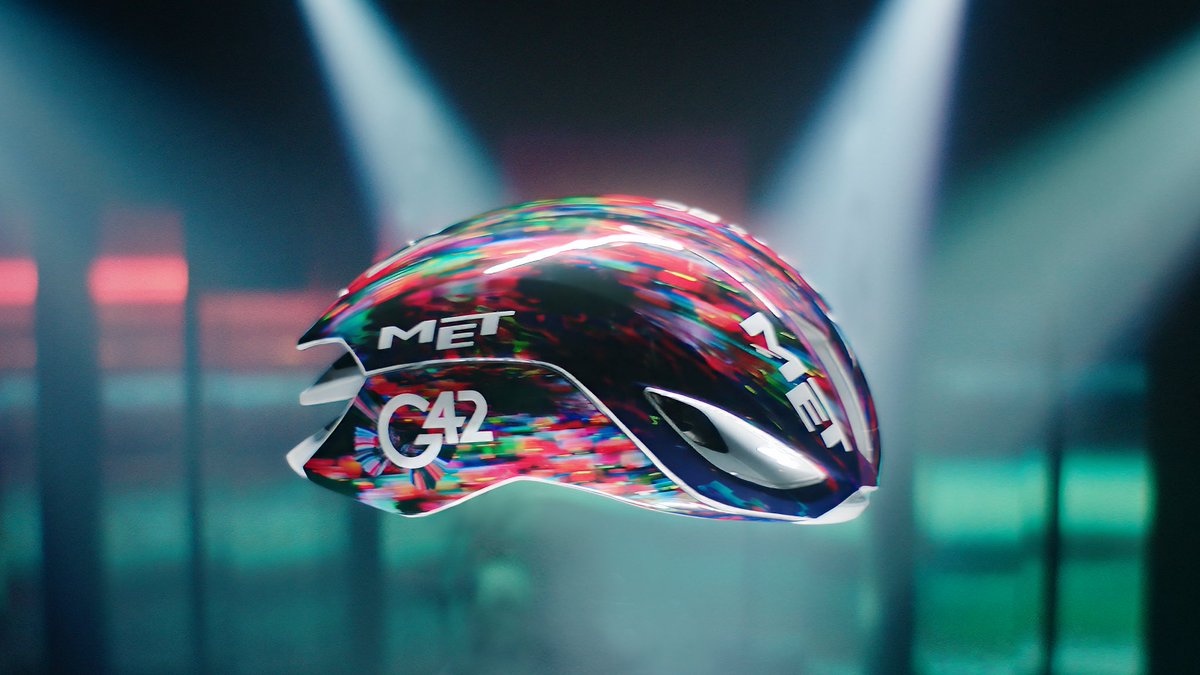G42ai's tweet photo. Back on cycling's biggest stage.

The AI-designed helmet, created by @gizakdag in collaboration with @met_helmets, is being worn by @TeamEmiratesUAE on today's #TDF2026 fifth stage to Pau. 

#Helmetverse #G42 #G42ai #Exponentialai #AI #Technology #DigitalTransformation #WeAreUAE #TDF2026
