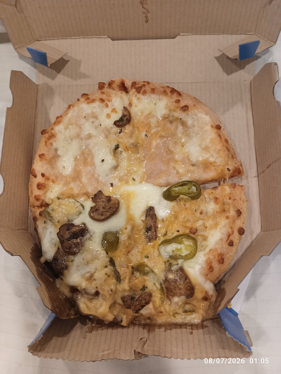 pk6165's tweet photo. @dominos_india i have ordered today from dominos, first of all order was upside down, all cheese fell one side,
Secondly i have received wrong order another pizza, when i go to app help section they are giving me beg of 100 rs why ? 

I am attaching screenshot of food and bill. https://t.co/CzJbavlV2F