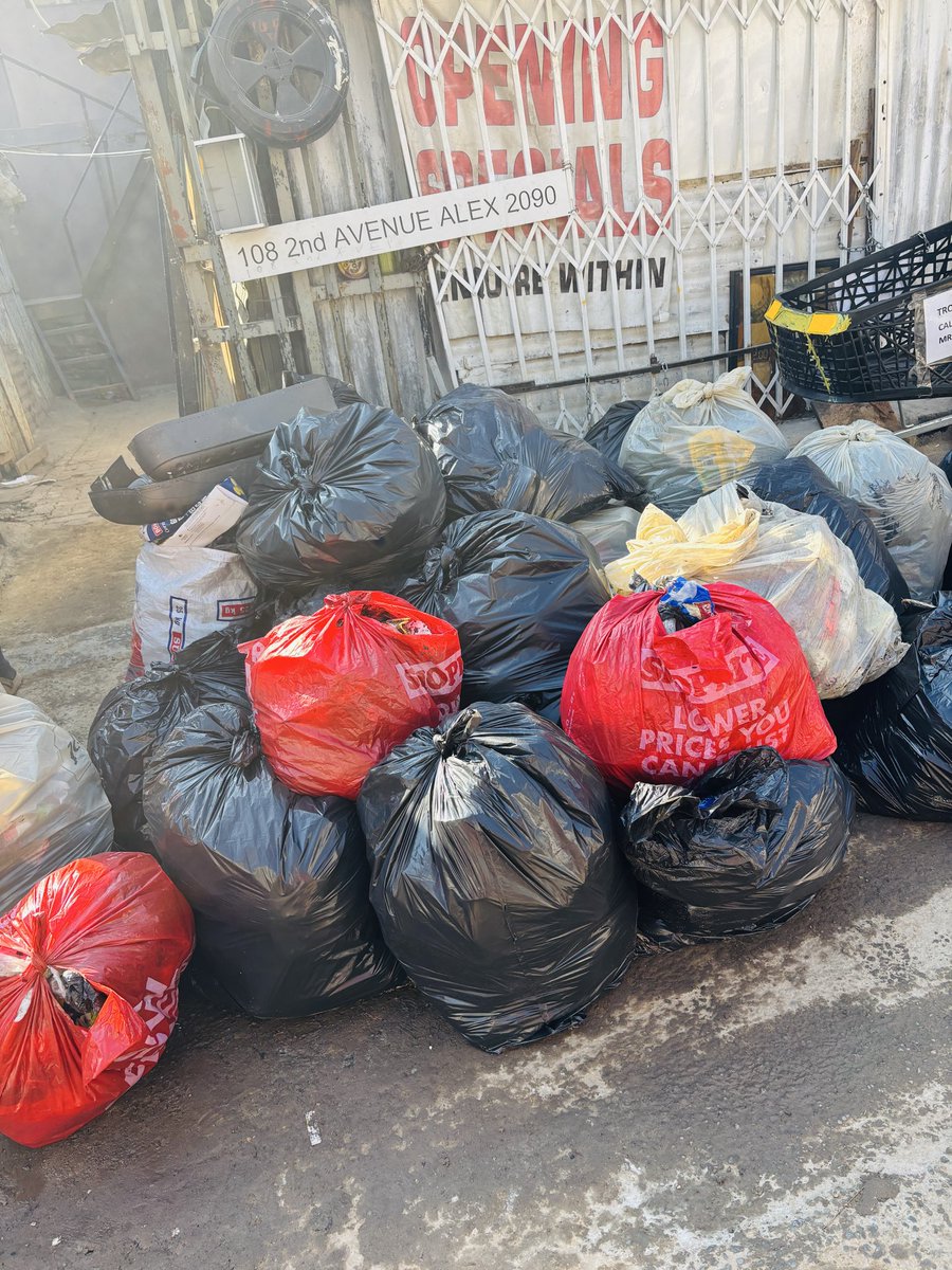 OurCityNews's tweet photo. Residents in Alexandra have taken matters into their own hands, cleaning their streets as the Pikitup strike continues and uncollected waste piles up. The disruption in services follows a strike by casual workers employed by Pikitup, who are demanding permanent employment. The latest delays have compounded an existing backlog caused by the nationwide marches on 30 June. #Joburg #pikitupstrike #ourcitynews