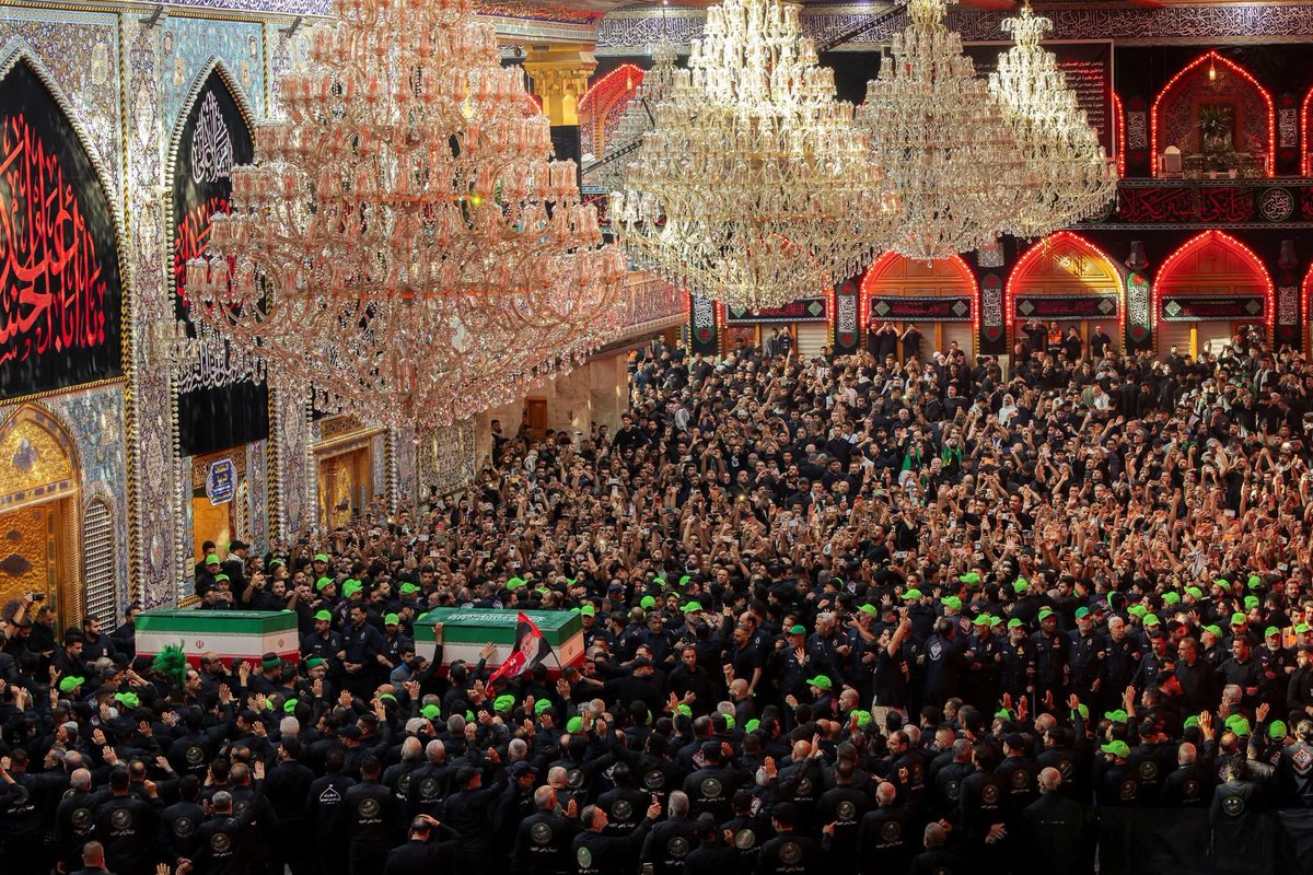 AdamARog's tweet photo. Mourners carry the coffins of family members of Iran’s late Supreme Leader Ayatollah Ali Khamene'i, inside the shrine of Imam Abbas during funeral ceremonies in Karbala, Iraq. #MartyrKhamenei https://t.co/AuT7viJHr1