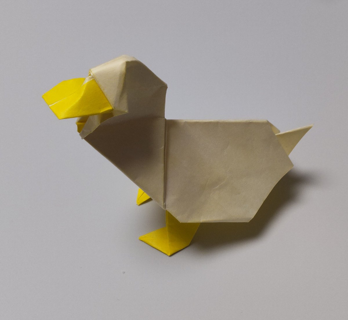origami_cd_20's tweet photo. 新作です。2026年009作め。意欲度7/10。
「アヒル」
不切正方形1枚折り。3等分(6等分)から。 https://t.co/J2O0LddP6C