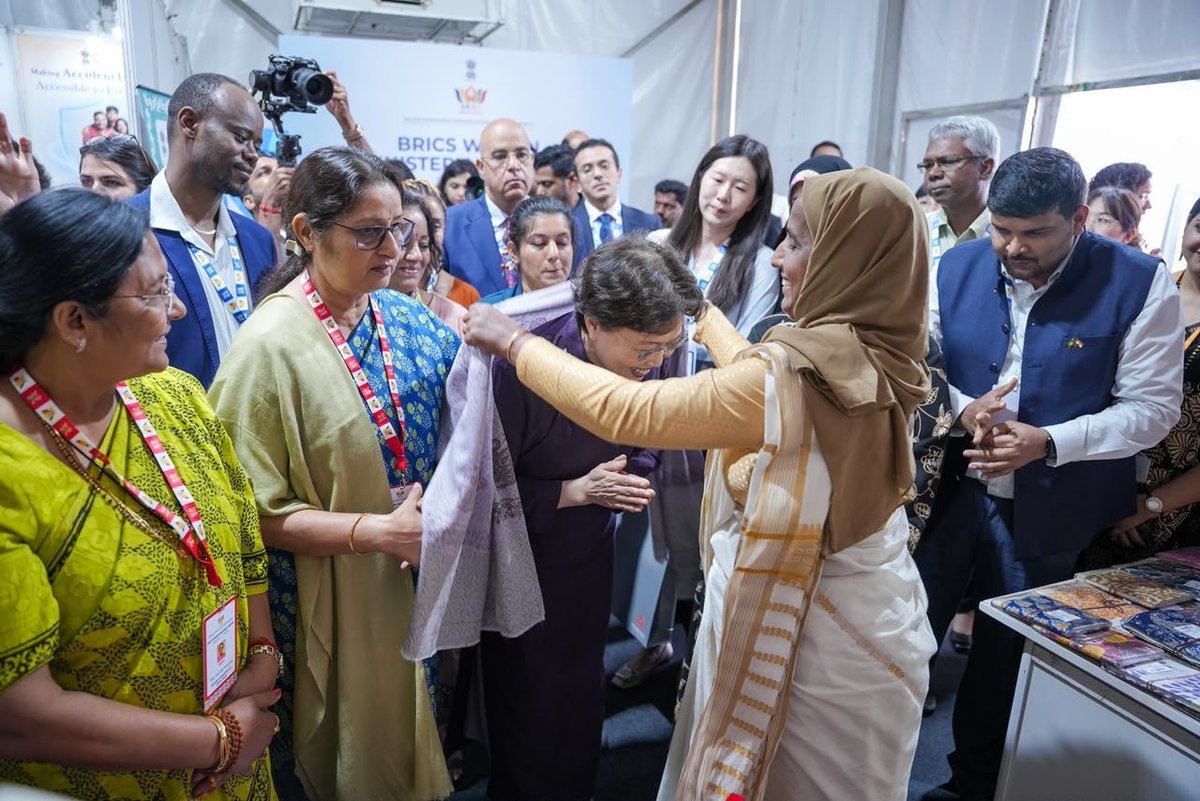MinistryWCD's tweet photo. At the BRICS Women Ministerial Meeting  Hon. Minister for Women &amp; Child Development Smt. @Annapurna4BJP along with BRICS Ministers &amp; Heads of Delegation, walked through an exhibition showcasing India's landmark initiatives across Rural Development, STEM, Nutrition &amp; Education. https://t.co/68kfPZEyVz