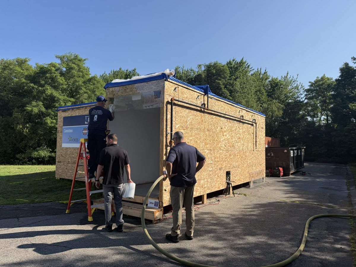 CommonVoices1's tweet photo. Common Voices Advocate #RobFeeney and @NFSAorg’s @vickiep4 in #FallRiverMA today for a live #firesprinkler demo recreating the dangerous conditions of the fatal #GabrielHouseFire and the difference properly installed, tested, maintained and inspected fire sprinklers would have made. #neveragain!