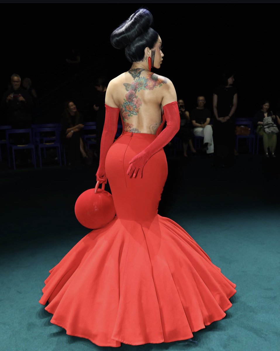 DwayneJay's tweet photo. These can’t be the same tattoos that [redacted] said were ugly because HUH!!?! The open back of this Robert Wun dress was a beautiful showcase for Cardi. https://t.co/vDzHRiD7uX