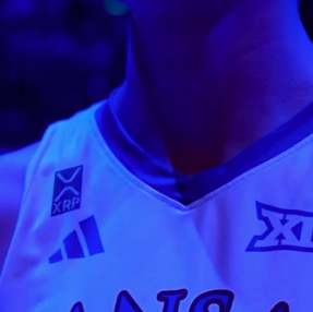 coinbureau's tweet photo. 🚨XRP FIRST CRYPTO TO SPONSOR COLLEGIATE SPORTS

The company is now an official sponsor of Kansas Jayhawks sports, a deal tied to CEO Brad Garlinghouse’s alma mater.

As part of the sponsorship, an $XRP patch will be placed on team jerseys, the first crypto firm to do so. https://t.co/yj0eaE04c5