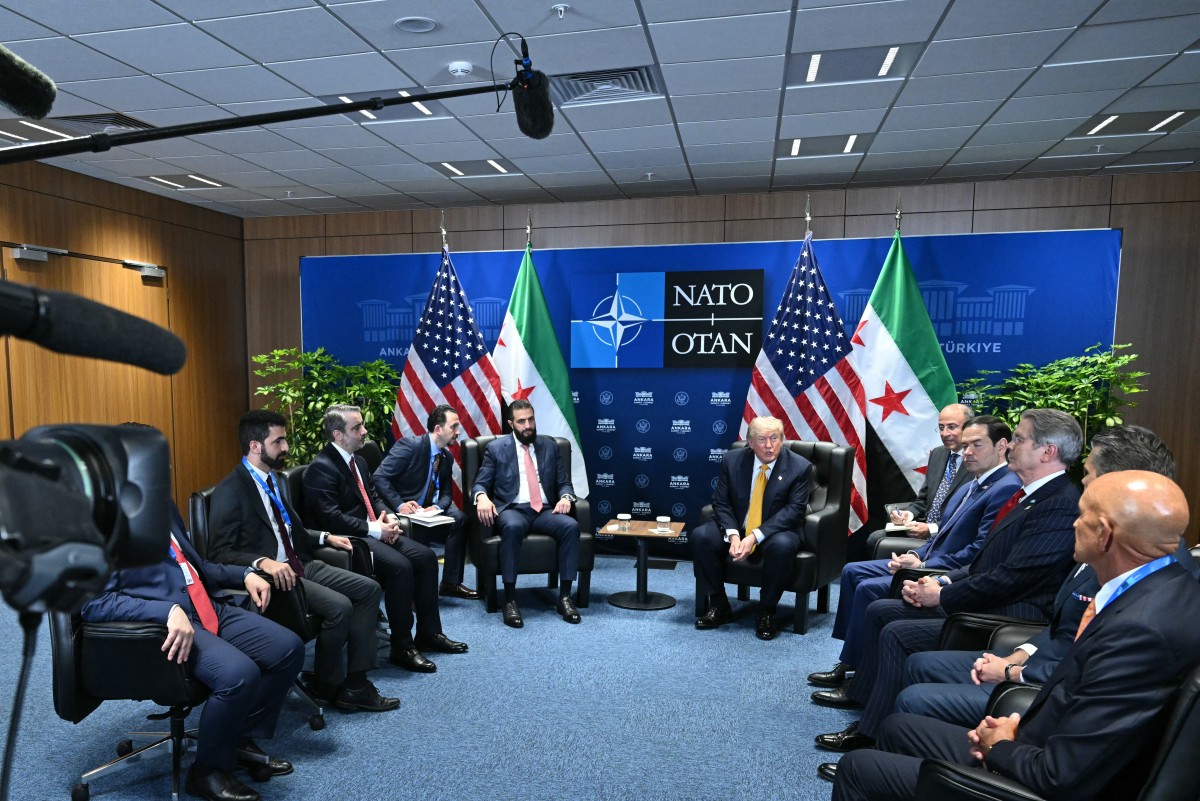 Channel8English's tweet photo. U.S. President Donald Trump meets with Syrian President Ahmad al-Sharaa at the NATO summit in Ankara. https://t.co/LkfpBJgGBl