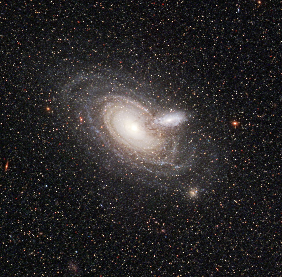 NASAHubble's tweet photo. A galactic photobomb!

By a chance alignment, two galaxies overlap in this Hubble image. And another galaxy appears, too –  most of the stars sprawled across the background belong to another spiral galaxy called NGC 253, which is out of frame to the right: https://t.co/TyCFOo6a0v https://t.co/O4FI7o8EaK
