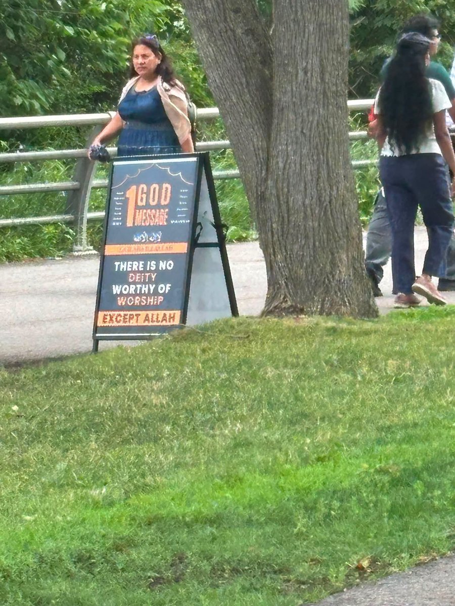 ThomasKelloggNY's tweet photo. Niagara Falls State Park — America’s oldest state park — now has this sign right there in the middle of it:

“THE 1 GOD MESSAGE  
THERE IS NO DEITY WORTHY OF WORSHIP EXCEPT ALLAH”

Under Democrat control of Buffalo, Erie County, and Niagara County (plus Hochul’s parks department), our iconic public spaces are being turned into billboards for imported ideologies.

This isn’t preserving a national treasure. This is the result of years of open-border policies and failed assimilation.

America First means our parks stay focused on natural beauty and American heritage — not da’wah stations.

Time to clean this up.