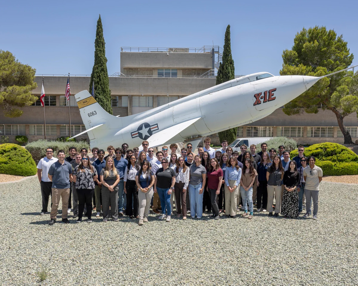 NASA 2026 summer interns gather in front of the historic X-1E aircraft at NASA’s Armstrong Flight Research Center in Edwards, California, on Monday, June 1, 2026. Credit: NASA/Ryan Kline