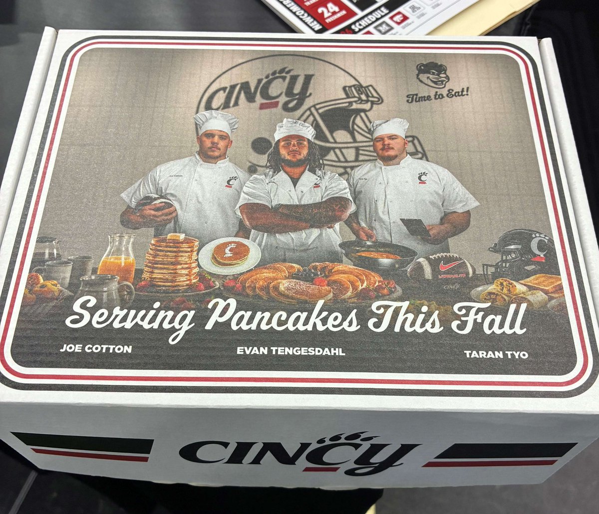 TheFWAA's tweet photo. Kudos to Cincy SID's Zach Stipe and Chris Cullum on the promo package for @GoBearcatsFB on their three outstanding OL's, Evan Tengesdahl, Joe Cotton and Taran Tyo. Promo box - "Serving pancakes this fall" - includes syrup, pancake mix and mascot merch. Cotton was an @outlandtrophy Player of the Week last year.
