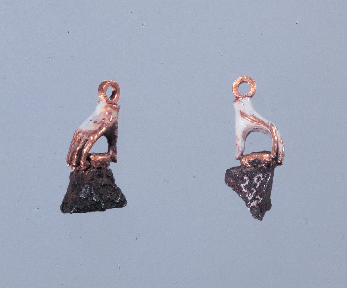 pmamtraveller's tweet photo. enamel earrings in the shape of hands holding the pieces of shrapnel removed from the eye and forehead of Denmark’s King Christian IV. He gave the earrings to his mistress. https://t.co/S1OUaAGazI