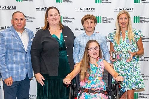 UMDF's tweet photo. Join us in congratulating the Kallaos family — William, Connie, Bill Jr., Bonnie, Olivia, and Liam — on being the recipients of this year's UMDF Energy Award! Watch their acceptance award video here: https://t.co/7mtSCYElhX #mitochondrialdisease https://t.co/uIE9XC0hBn