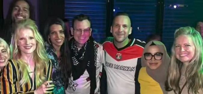 Daniel_Sugarman's tweet photo. Just for the record, the guy talked about here, Matthew Broadley, is the one in a keffiyeh standing between Zack Polanski (wearing the "Free Marwan" Barghouti t-shirt, naturally) and Faiza Shaheen, with Hannah Spencer MP immediately to their right. 
Last month. https://t.co/s4eESe1dsE
