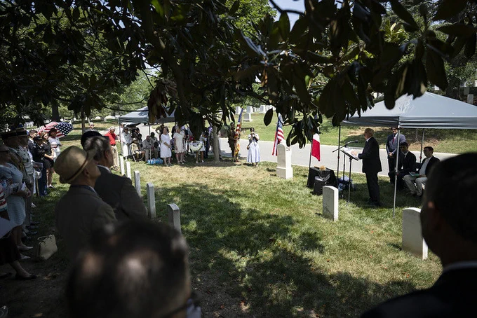 Attendees listen to remarks during the ceremony.