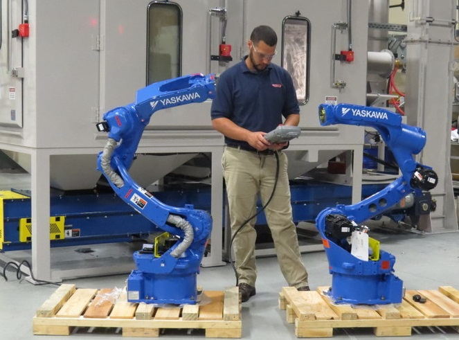 FICorpX's tweet photo. The physical AI wedge is not only humanoids.

@YASKAWA's Motoman NEXT points at a less cinematic but very real target: the messy middle of automation.

Random bin picking. Variable assembly. High-mix handling. Force control. Vision. Path planning.

That is where demos become workcells.