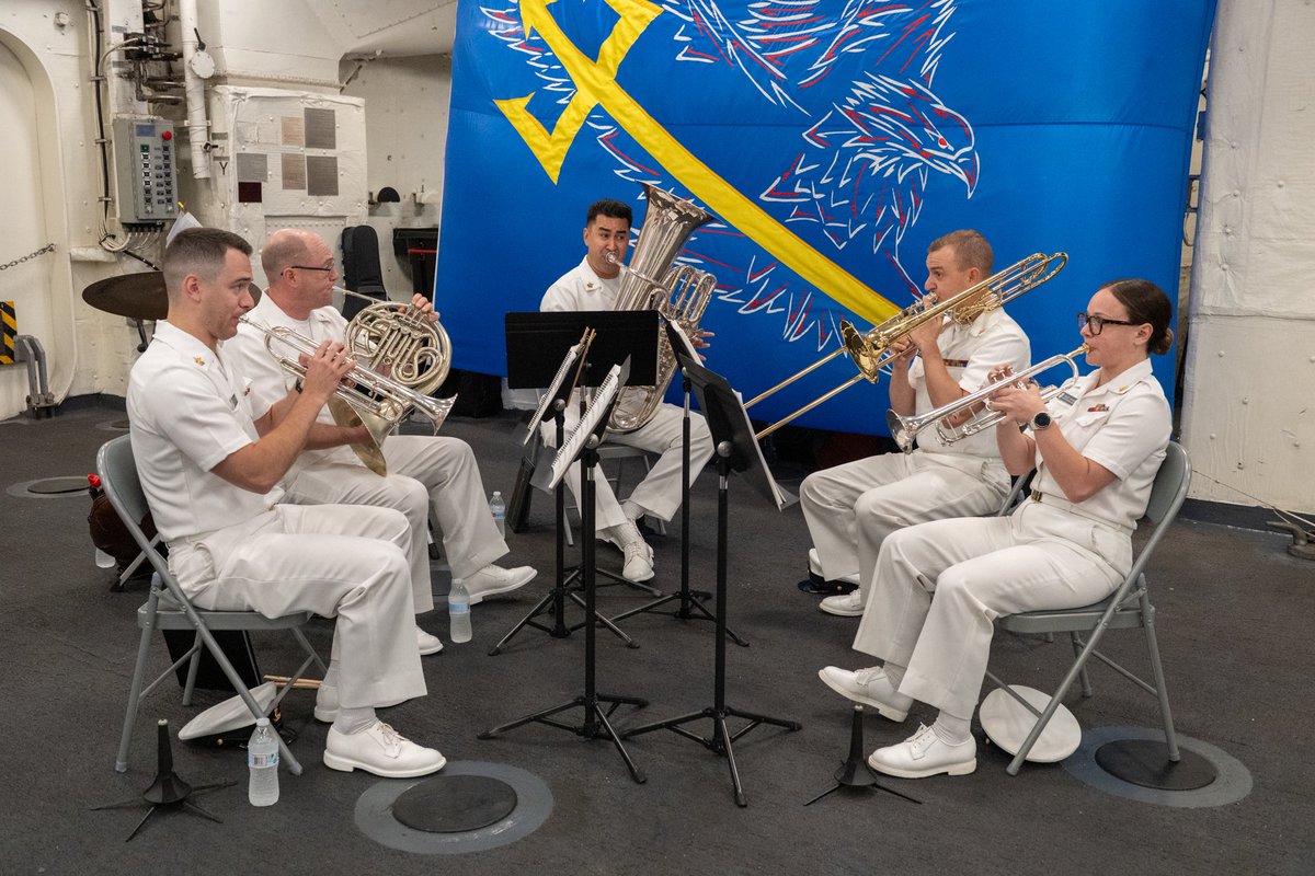 usnavyband's tweet photo. On July 7, the U.S. Navy Band Brass Quintet and Commodores Jazz Combo performed at the International Naval Review Closing Ceremony aboard USS Arlington (LPD 24) in New York City. 

#USNavy #INR250 #America250 #NYC https://t.co/1TZq9Z9nmU