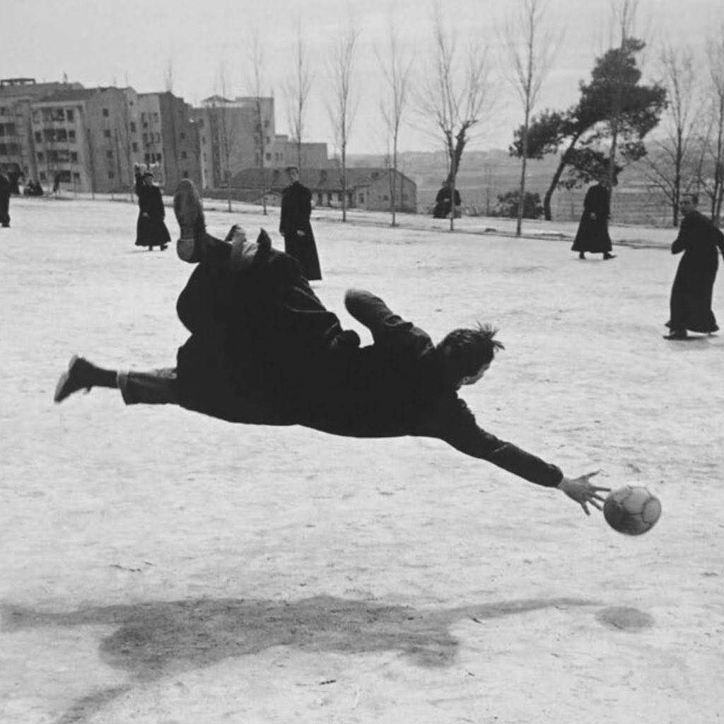 awkwardgoogle's tweet photo. Seminarians playing football in their cassocks at the Conciliar Seminary of Madrid, Spain,1959. https://t.co/EqsFnxifXu
