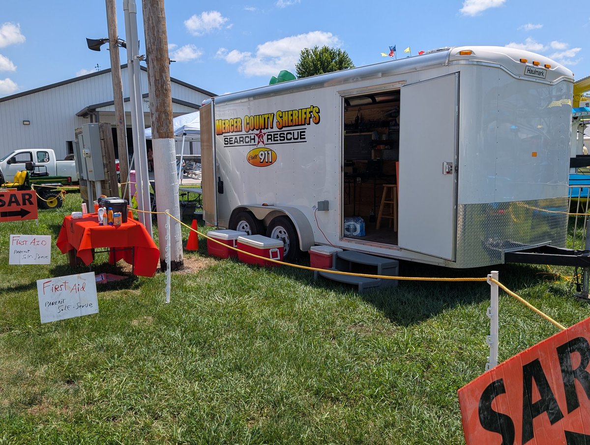 MercerSAR's tweet photo. Your Mercer County Sheriff's Search and Rescue #SAR team is on the grounds for this year's @mercofairIL once again. We're keeping an eye on fairgoers and assisting, if needed. We have a self-serve first-aid station located in our trailer on the midway across from Floral Hall. https://t.co/a5HEEyCzR7