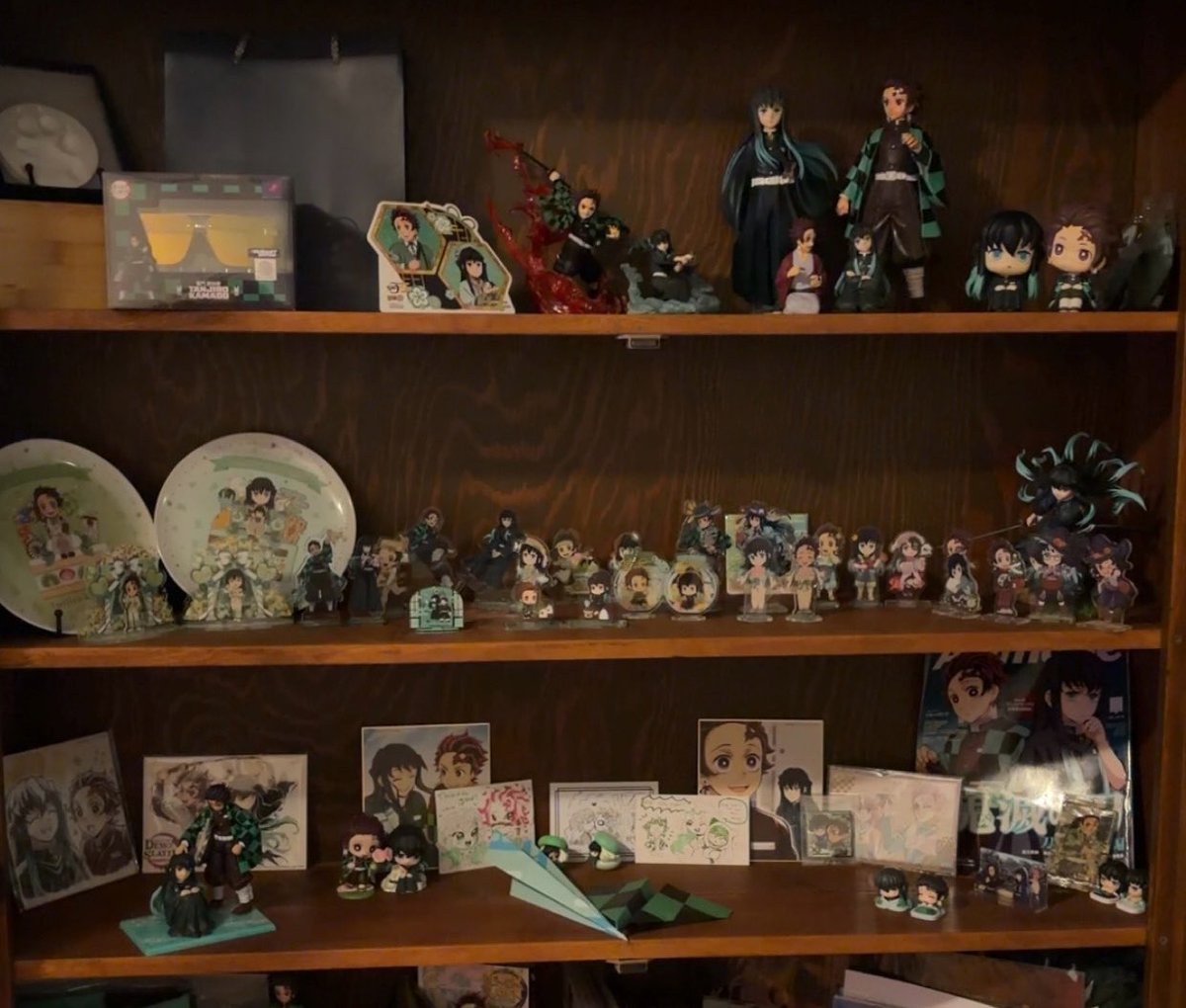 ssunmist's tweet photo. (Repost bc I didn’t like how the bottom shelf looked gotta rearrange that) 
Wow I wonder what my favorite demon slayer ship is https://t.co/3iDseAeaN0
