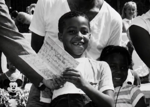 historyinmemes's tweet photo. A 7-year-old boy became Disney World’s 200 millionth guest and was awarded free admission for life. Nearly 40 years later, he is still taking advantage of the prize, visiting the parks with his wife and children.

In July 1985, seven-year-old Virgil Waytes Jr. of Miami unknowingly became Walt Disney World’s 200 millionth guest as he passed through the entrance gates during his family’s first visit to the park.

Disney marked the milestone with live music, fireworks, and a special ceremony that left the young boy completely surprised. As part of the celebration, he received one of the company’s rarest rewards: a lifetime pass granting free admission to Disney theme parks around the world.

Nearly four decades later, Waytes still makes regular use of the extraordinary pass. It has no blackout dates and allows him to bring up to three guests on each visit. Now living in North Carolina, he often takes his wife and children to the parks, saying the greatest reward has been creating lasting family memories without the high cost of admission. Disney continues to honor the lifetime pass, and on some visits it has even covered food and merchandise purchases.
