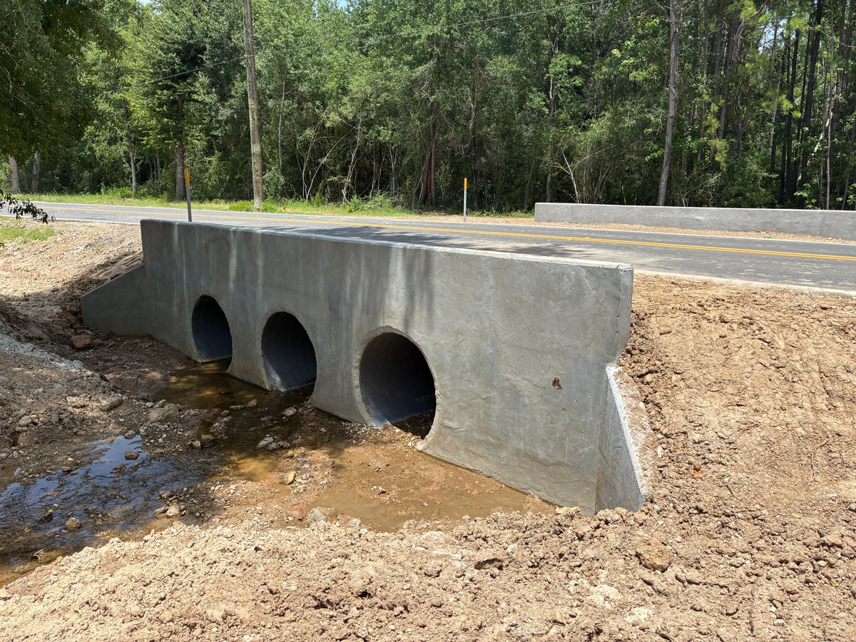 commprecinct2's tweet photo. Recent headwall additions were completed off of Moore Rd and Hardin Store Rd.  These stable structural supports protect the road from collapsing into the pipe ensuring that the water flow does not erode the pipe or the surrounding area. https://t.co/Wax3wqcTMk