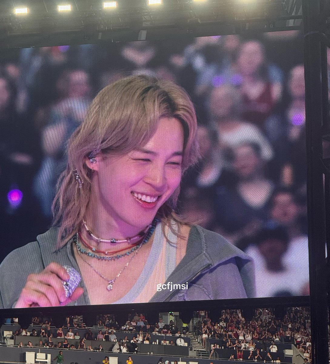 trulyjmin's tweet photo. jimin on the big screen smiling you're everything to me https://t.co/DskeHp1aTr