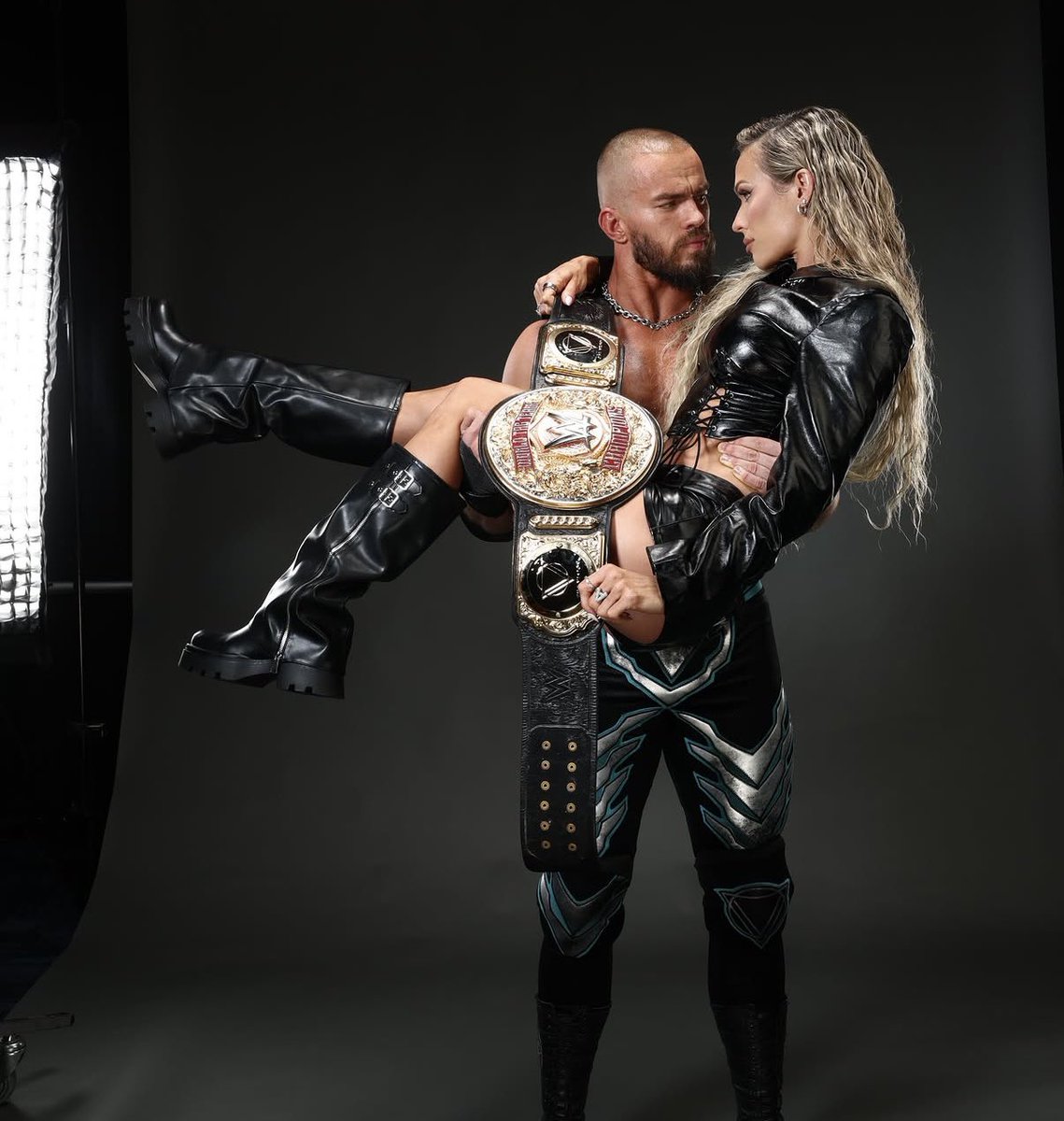 FadeAwayMedia's tweet photo. Austin Theory showing off his Championship gold &amp; newest member of ‘The Vison’ Maxxine Dupri. https://t.co/2IYN1LJ1dv
