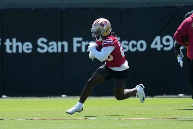 BigPickDaddy's tweet photo. Kaelon Black - RB - SF - We discussed in the Jordan James preview how the Niners want to preserve McCaffrey. I anticipate Black to be the main beneficiary of that. The Niners used a 3rd round pick on Black and he’ll compete with James for the backup role. 

Black is a compact, decisive one-cut RB with burst and contact balance, built to grind between the tackles in zone schemes while offering functional but unspectacular receiving and long speed. The Shanahan offenses have made fantasy studs out of backs with those qualities. 

Black likely has little value if McCaffrey stays healthy, but he’s still the back I’d want to handcuff to McCaffrey. 

He’s a great swing for the fences candidate with your last pick and will be a league winner if anything were to happen to CMC.