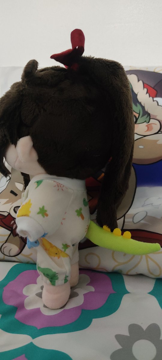 Xianventures's tweet photo. Xian Xian put on his dino pyjamas (with a dino tail), got cozy in bed and is ready to sleep the night away 💤 
No blanket on because it's too hot! Sweet dreams~ ✨ https://t.co/tpEHWcNS8E