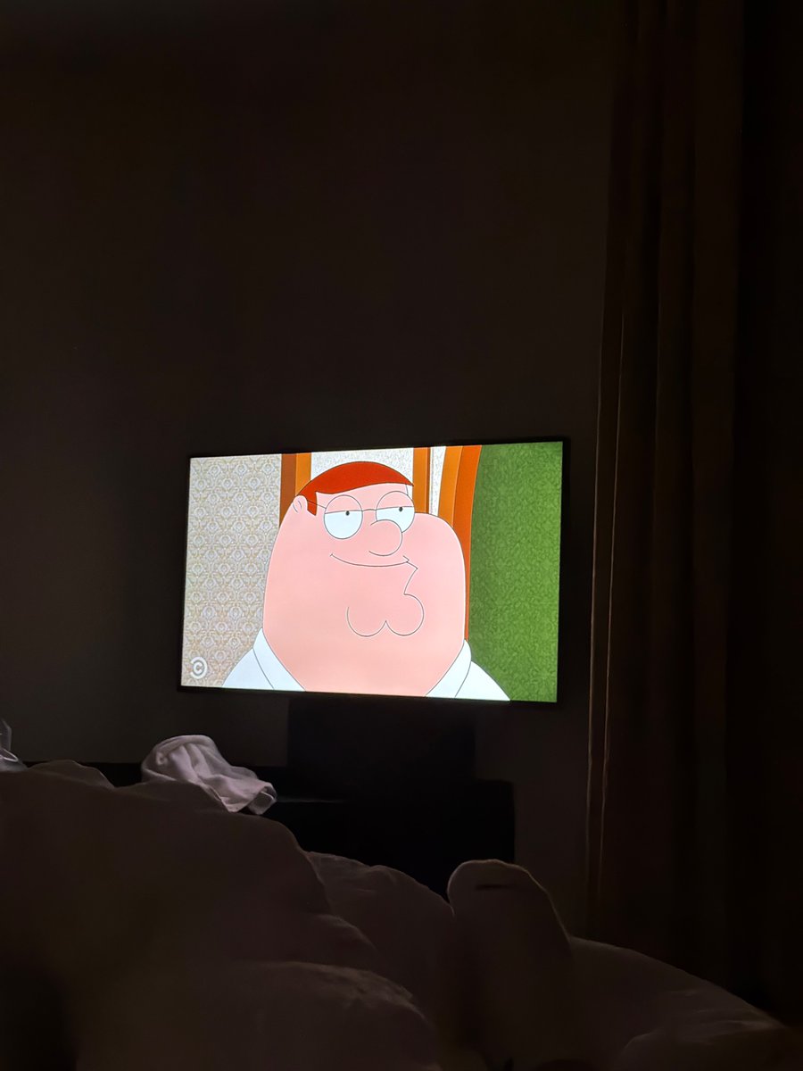 cloutpriest's tweet photo. Hotel room on company dime = big Griffin on the tele https://t.co/GNoLIF09jf