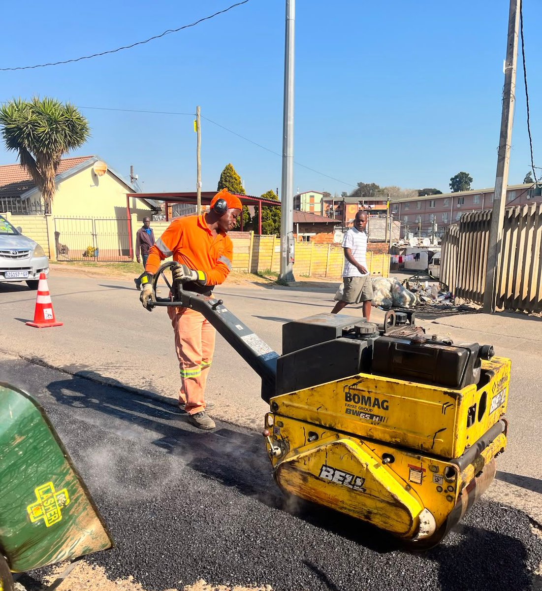 MyJRA's tweet photo. Road patching works on Josias Madzunya Street in Alexandra, Region E, to restore the road surface and improve traffic flow 🚧 @CityofJoburgZA @CoJ_RegionE https://t.co/rFYPTWAmio