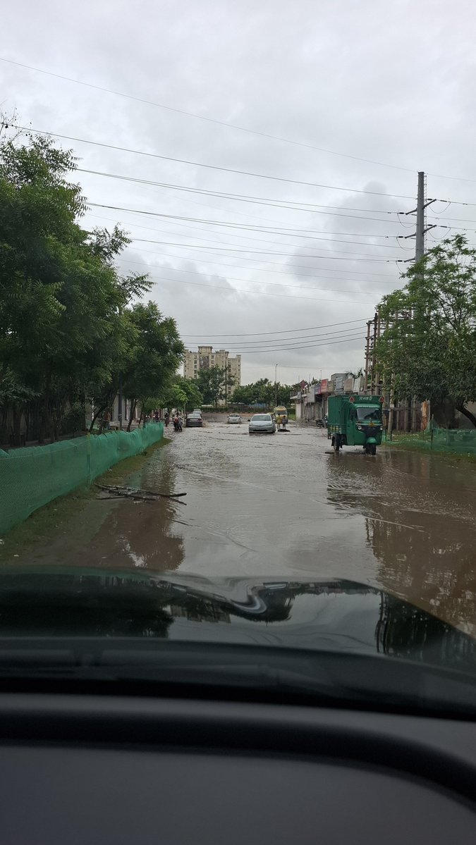 deepak1114's tweet photo. @OfficialGMDA @MunCorpGurugram 
Sec 69 Tulip white road is always full of water being too low. Kids are swimming in the water after 2 days of moderate rain. Too much hassle for commuters. Please look into this. https://t.co/0ja7qRNiAQ