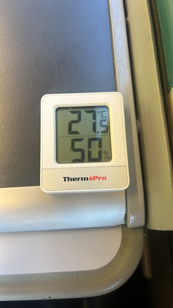 adam_schnider's tweet photo. @chilternrailway I’ve now decided to bring a thermometer on board these days to show you the temps inside your carriages. I’m on the delayed 7:30 from Haddenham. Temp outside is approx 22/23 and temp inside the carriage is 27.4 degrees. Again, why aren’t your ACs working? https://t.co/c7vby0sWOw