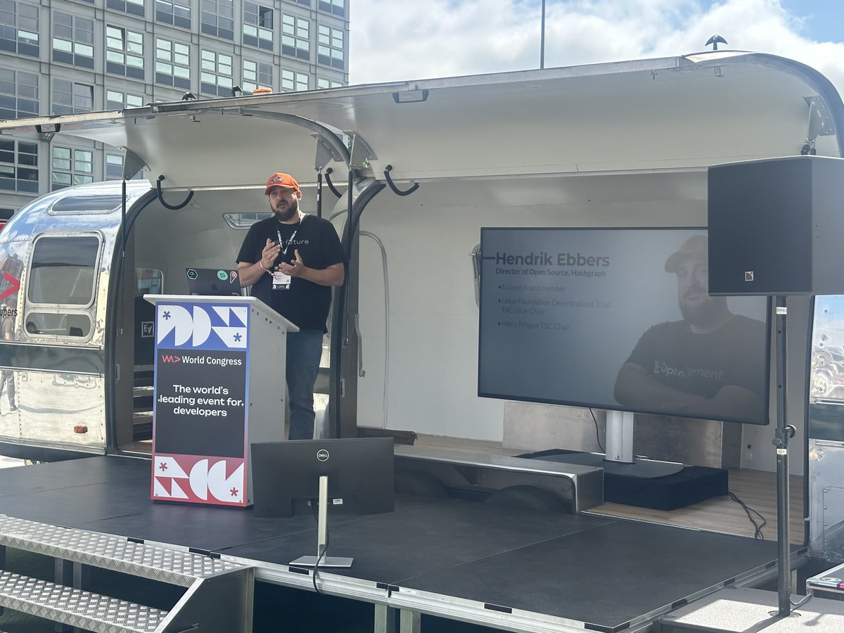 hedera's tweet photo. @HendrikEbbers, Director of Open Source at @Hashgraph, took the stage at @WeAreDevs to unpack what it really takes to build open source ecosystems that work for everyone.

Shared governance. Transparent decisions. Balanced contribution. No single voice dominating.

That's vendor neutrality by design.