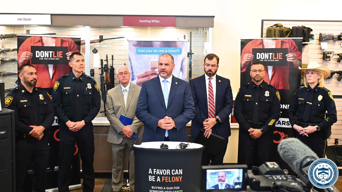ATF Houston Field Division Special Agent in Charge Michael Weddel speaking at the podium, alongside NSSF CEO/President Joe Bartozzi, U.S. Attorney Justin Simmons, and representatives from the Bexar County Sherriff’s Office and San Antonio Police Department. 