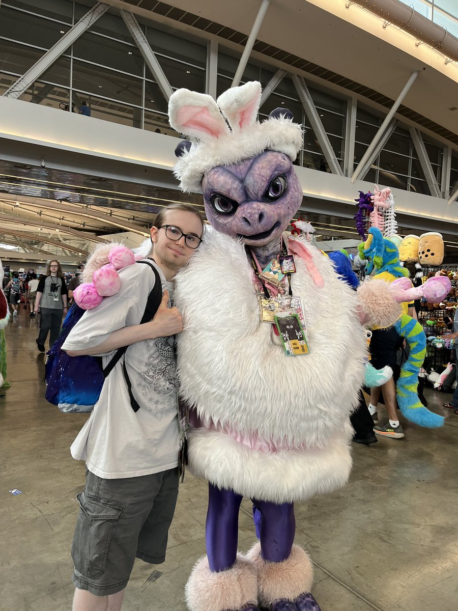 dextergrizzlee's tweet photo. What are you talking about?
I found Mewtwo, he’s right here!

Taken from when I met @CadpigJR at #anthrocon2026. Thanks for the cuddly, fluffy, and satin-y hugs, Mew!  ^^ https://t.co/hRdcWMB0AE
