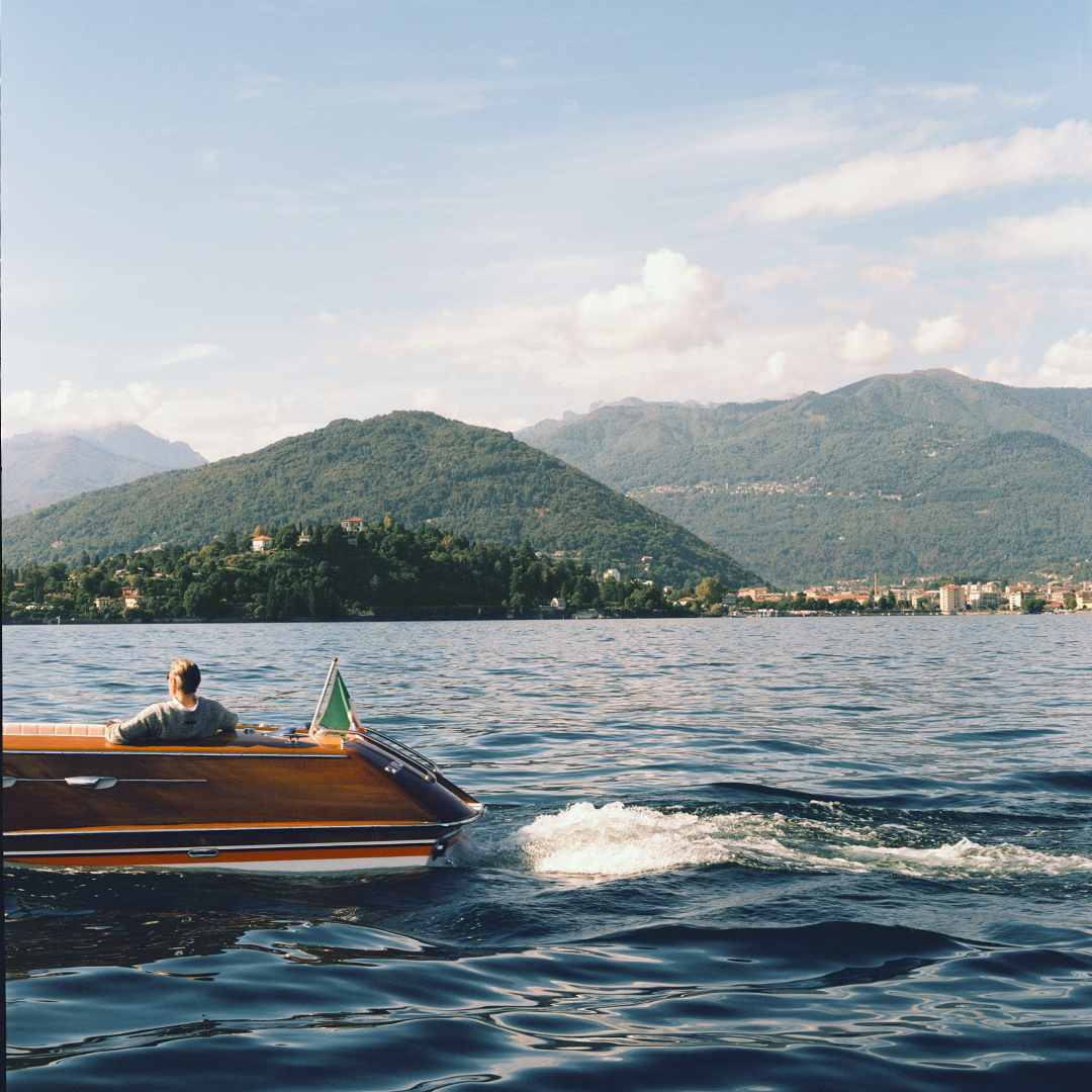 Zegna's tweet photo. RITUALS OF AN ITALIAN SUMMER 

Mads Mikkelsen on Lake Maggiore aboard the Riva Aquarama, an icon of 1960s Italian design.

#ZEGNASUMMER26 https://t.co/XbQuksxige