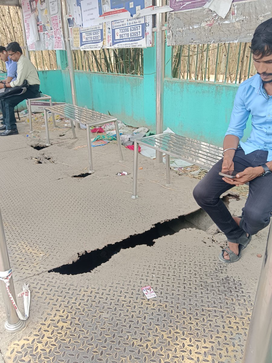 VarmanB's tweet photo. Another sample of worst situation SIPCOT Siruseri, Bus stop used by more than one lakh  working professionals/income tax payers per day, look at my last post on potholes and walkway situation too, where is the safety?? The broken Tariff signal,whose responsibility?Sack the admin? https://t.co/OSgxo3UMaS
