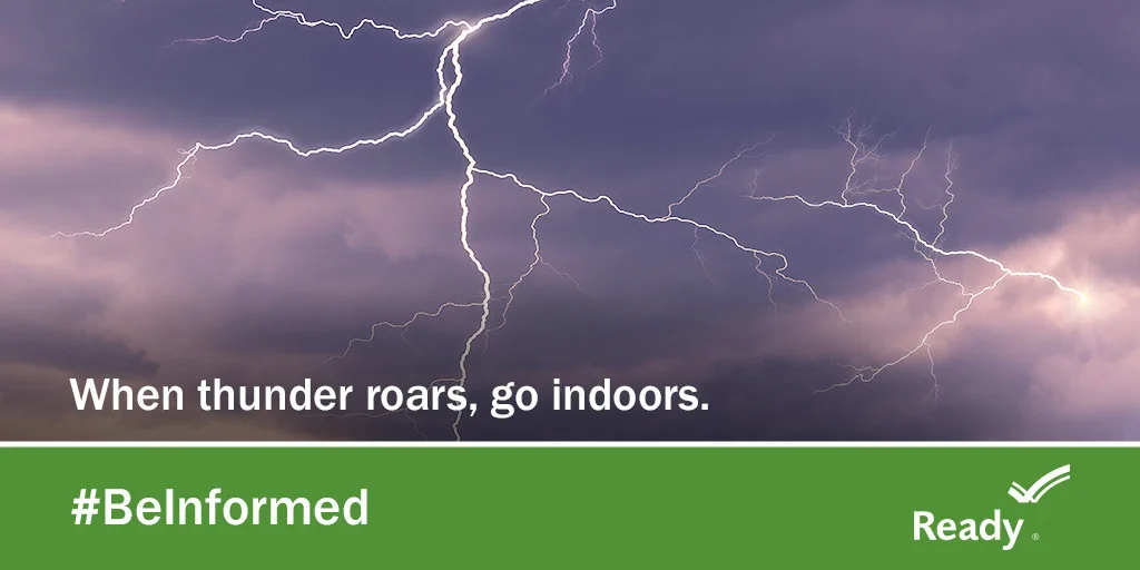 Lightning bolts streak across a dark stormy sky with the message 'When thunder roars, go indoors' and #BeInformed safety reminder.